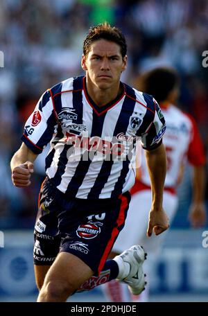 Monterrey's soccer player Guillermo Franco, front, from Argentina head the  ball as Toluca' Carlos Esquivel challenges during the first leg of the  Mexican league championship soccer final at the Nemecio Diez stadium