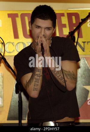 new inxs lead singer jd fortune sings during a live acoustic performance to promote the bands latest album switch at a record store in new york tuesday nov 29 2005 ap photojason decrow 2pdhy57