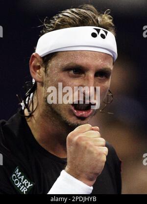 World's number one player, Switzerland's Roger Federer prepares to serve a  ball against Argentina's David Nalbandian (unseen) during the opening match  for the Shanghai Tennis Masters Cup held at the Qi Zhong