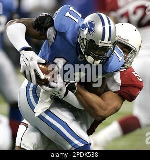 Arizona Cardinals linebacker James Darling (51) returns an interception as  Colts tight end Ben Hartsock (80) tries to make the tackle. The Colts  defeated the Cardinals 17-13 at the RCA Dome in