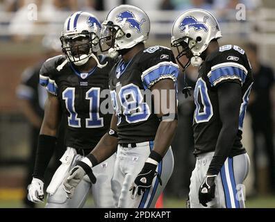 Detroit Lions wide receivers Roy Williams, left, and Calvin Johnson watch  during football training camp in Allen Park, Mich., Wednesday, Aug. 8,  2007. (AP Photo/Paul Sancya Stock Photo - Alamy