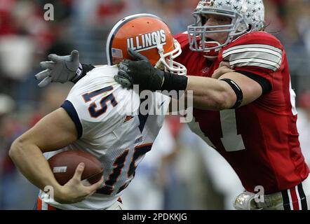 Ohio State linebacker A.J. Hawk (47) celebrates with teammate David  Patterson (97) after sacking Notre Dame quarterback Brady Quinn (10) in the  second half of the Fiesta Bowl college football game, Monday