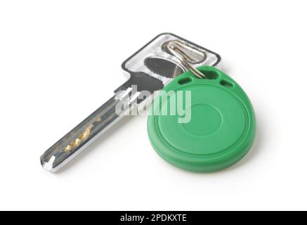 Key with green plastic rfid  key fob isolated on white Stock Photo