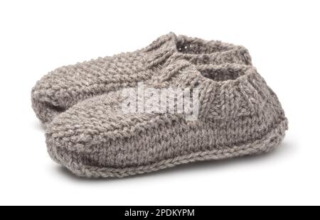 Pair of gray woolen knitted slipper socks isolated on white Stock Photo