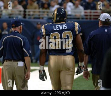 San Francisco Forty Niners quarterback Tim Rattay feels the pressure of St.  Louis Rams Damione Lewis, #92 and Leonard Littlel in the 2nd quarter of  their game at Monster Park in San