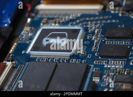Chip in automotive manufacturing. Electronic circuit boards with SMT chips. Smart car micro chip concept background. Stock Photo