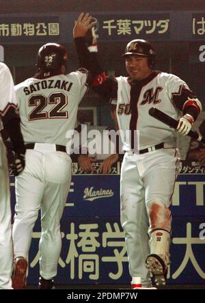 Chiba Lotte Marines manager Bobby Valentine, right, watches his team's  practice as outfielder Benny Agbayani, a former New York Mets player, walks  by before Game One in the Japan Series at Chiba