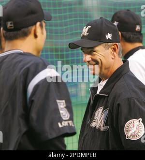 Chiba Lotte Marines manager Bobby Valentine, right, watches his team's  practice as outfielder Benny Agbayani, a former New York Mets player, walks  by before Game One in the Japan Series at Chiba