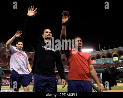 St. Louis Cardinals players Yadier Molina, left, and Ron Villone