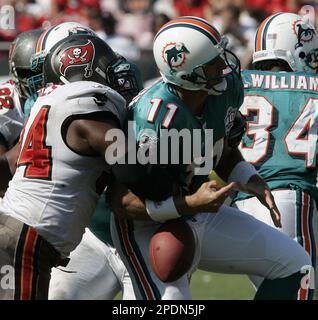 Tampa Bay Buccaneers' linebacker Shelton Quarles (53) tackles Seattle  Seahawks' running back Shaun Alexander as Seahawks' tight end Jerramy  Stevens (86) blocks Buccaneers' defensive end Greg Spires (94) at Raymond  James Stadium