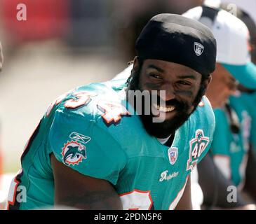 Miami Dolphins' Ricky Williams glances at the scoreboard during the first  half in a game against the Tampa Bay Buccaneers at Raymond James Stadium Oct.  16, 2005 in Tampa, Fl. The Buccaneers