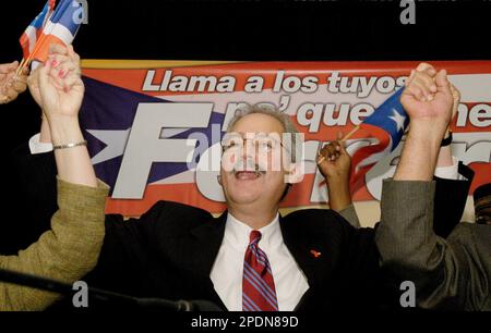 Supporters of mayoral candidate Fernando Ferrer, second left, clamour for a  chance to greet Ferrer and former President Bill Clinton as they campaign  together in the Bronx borough of New York Thursday