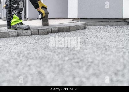 construction of a sidewalk from concrete blocks Stock Photo