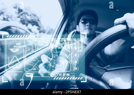 male car driver using GPS navigator system on hologram touch panel modern technology for transportation assistant Stock Photo