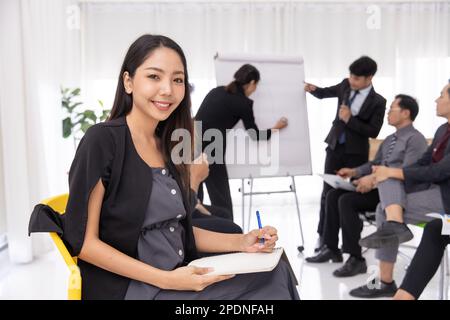 Portrait businee executive woman in office meeting room. Smart Asian lady young new generation leader. Stock Photo
