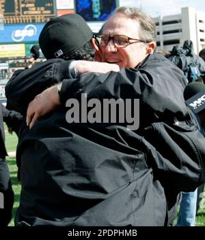 Chicago White Sox manager Ozzie Guillen, left, gets his 2005 World Series  Championship ring from chairman Jerry Reinsdorf before the game against the  Cleveland Indians on April 4, 2006, in Chicago. (UPI