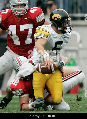 Ohio State linebacker A.J. Hawk (47) celebrates with teammate