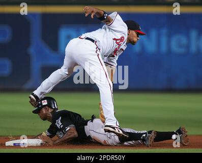 The Florida Marlins' Juan Pierre steals second base as the New York  Yankees' Derek Jeter applies the tag in Game 1 of the World Series at  Yankee Stadium on October 18, 2003.