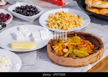 Hearty rich turkish breakfast on a table in restaurant Stock Photo
