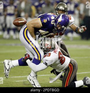 Tampa Bay Buccaneers' linebacker Shelton Quarles (53) tackles Seattle  Seahawks' running back Shaun Alexander as Seahawks' tight end Jerramy  Stevens (86) blocks Buccaneers' defensive end Greg Spires (94) at Raymond  James Stadium