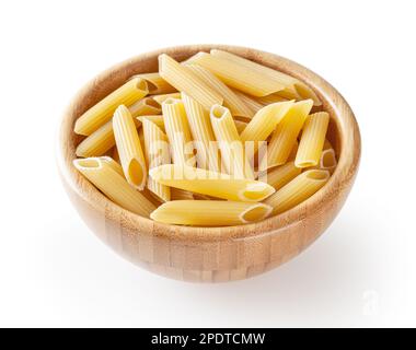 Uncooked penne pasta in wooden bowl isolated on white background with clipping path Stock Photo