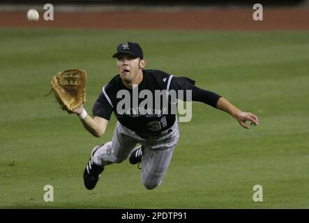 Colorado Rockies center fielder Cory Sullivan dives to rob San Diego Padres' Brian Giles of a hit in the first inning Wednesday, Sept. 7, 2005, in San Diego. (AP Photo/Lenny Ignelzi)