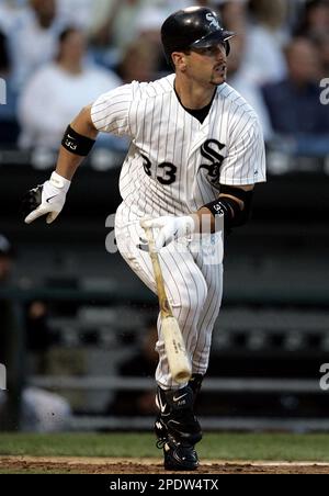 Chicago White Sox' Aaron Rowand is congratulated by Paul Konerko