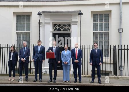 London, UK. 15th Mar, 2023. London UK 15th March 2023Hunt with his ministerial team outside No11. Chancellor of the Exchequer Jeremy Hunt leaves No11 Downing Street to head to Westminster to deliver his first Spring Budget. Credit: MARTIN DALTON/Alamy Live News