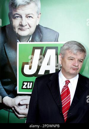 German Foreign Minister and Greens party top candidate for the general elections on Sept. 18, 2005, Joschka Fischer, stands in front of an election campaign poster in Berlin on Monday, Aug. 29, 2005. The Greens party presented their new election campaign TV spots to the press. Words in background read 'Yes to (Joschka)'. (AP Photo/Roberto Pfeil)