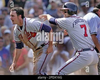 Atlanta Braves rookie Jeff Francoeur, right, celebrates with rookie catcher Brian  McCann after hitting a three-run homer off Chicago Cubs relief pitcher  Glendon Rusch in the eighth inning of the second game