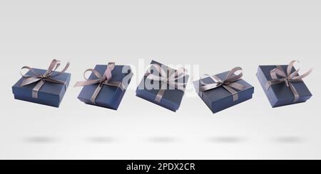 Beautifully wrapped gift boxes flying on light background Stock Photo