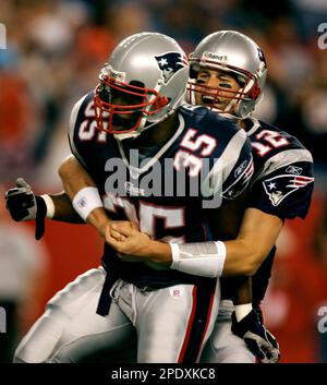 New England Patriots fullback Patrick Pass is embraced by
