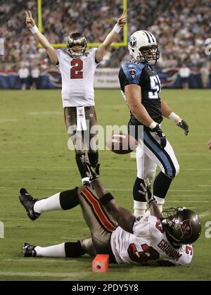 Baltimore Ravens' defensive tackle Haloti Ngata (92) runs the ball to the  Ravens' 7-yard-line after intercepting a pass from Tampa Bay Buccaneers'  quarterback Chris Simms during the second quarter at Raymond James