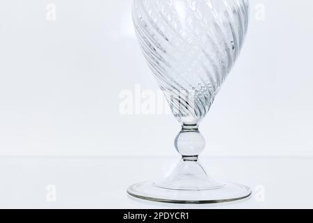 Abstract glass installation, fragments of transparent empty vase on white background Stock Photo