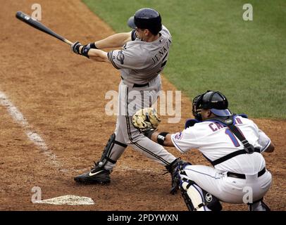 Milwaukee Brewers' Brady Clark is hit by a pitch from Minnesota