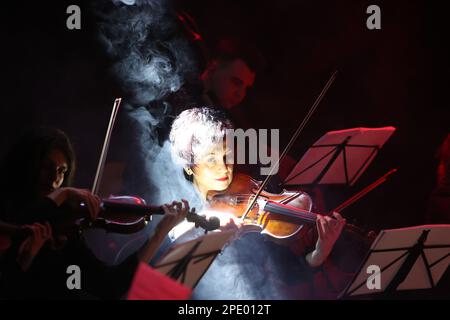 IVANO-FRANKIVSK, UKRAINE - MARCH 14, 2023 - Musicians of the Quattro Corde string ensemble are pictured during a joint charity concert with the Fontal Stock Photo