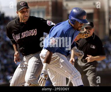 Chicago Cubs' Neifi Perez, right, is congratulated by teammates