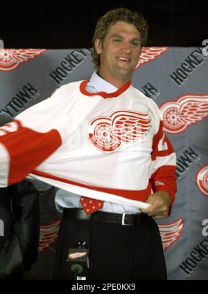 FILE ** Detroit Red Wing's Derian Hatcher is introduced to the