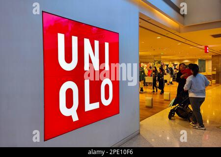 SHANGHAI, CHINA - MARCH 15, 2023 - Customers shop at UNIQLO clothing store in Shanghai, China, March 15, 2023. Stock Photo