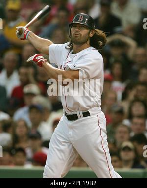 Boston Red Sox's Johnny Damon (18) breaks his bat singling against