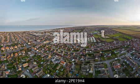 Aerial view of the seaside village of Caister-on-sea, near Great Yarmouth, featuring it's prominent 1930s-built water tower. Stock Photo