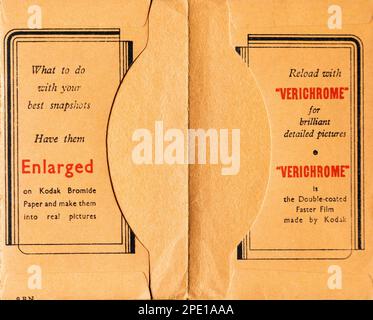 Interior of a vintage Kodak photographic prints wallet, featuring promotions for getting enlarged prints and for Verichrome film. Stock Photo