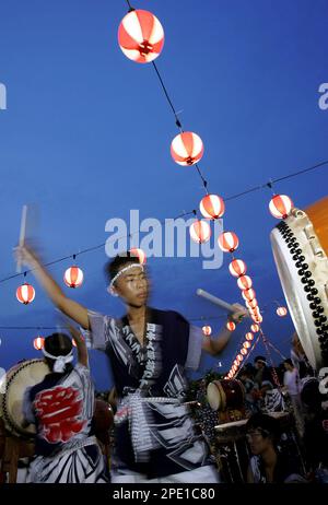 Drummers beat drums on the stage during the 29th Bon Odori Dance