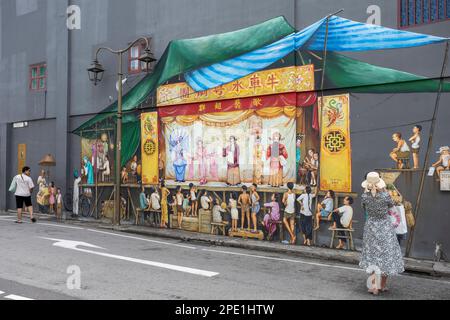 Artwork on walls in Chinatown, Singapore by street artist Yip Yew Cheong Stock Photo