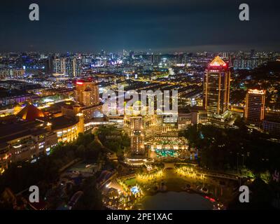 Sunway, Selangor, Malaysia - Nov 09 2022: Aerial view Sunway Pyramid, Sunway Lagoon, Sunway Resort in night Stock Photo