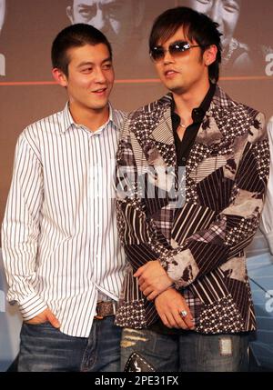 Internationally famed Taiwanese pop star Jay Chou, right, speaks with Hong  Kong actor Edison Chen at the final Asian premier of his new film Initial D,  Thursday, June 23, 2005, in Taipei