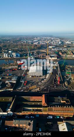 6th February 2023. Great Yarmouth, Norfolk.  Aerial view of construction of Yarmouth's 3rd River crossing from the east side.  Work was halted the very next day when a WWII unexploded bomb was dredge up on the far bank just left of new bridge structure.  The UXB was safely detonated in place a four days later after causing major disruption to local businesses and residents who had been evacuated. Stock Photo