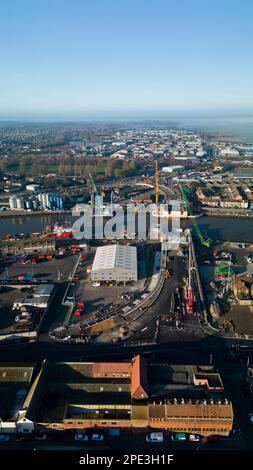 6th February 2023. Great Yarmouth, Norfolk.  Aerial view of construction of Yarmouth's 3rd River crossing from the east side.  Work was halted the very next day when a WWII unexploded bomb was dredge up on the far bank just left of new bridge structure.  The UXB was safely detonated in place a four days later after causing major disruption to local businesses and residents who had been evacuated. Stock Photo