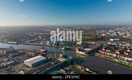 6th February 2023. Great Yarmouth, Norfolk.  Aerial view of construction of Yarmouth's 3rd River crossing from the east side.  Work was halted the very next day when a WWII unexploded bomb was dredge up on the far bank just left of new bridge structure.  The UXB was safely detonated in place a four days later after causing major disruption to local businesses and residents who had been evacuated. Stock Photo