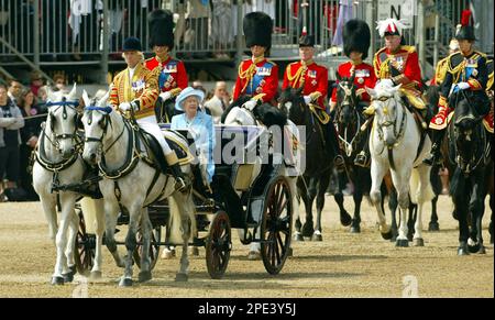 Britain's Queen Elizabeth II arrives to inspect the troops at London's Horse Guards before the annual Trooping the Colour parade marking her official birthday , Saturday, June 11, 2005. Some 1,220 troops took part in the spectacular display of precision formation marching and horsemanship choreographed to military band music. The Colour being paraded on London's Horse Guards this year was the flag of the 1st Battalion Irish Guards. (AP Photo/ Andrew Parsons, Pool)
